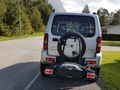 Suzuki Jimny with Thule Velocompact 2 tow bar mounted bicycle carrier - A04.jpg