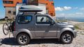 Suzuki Jimny - with roof box Thule Ocean 100 - A01.jpg